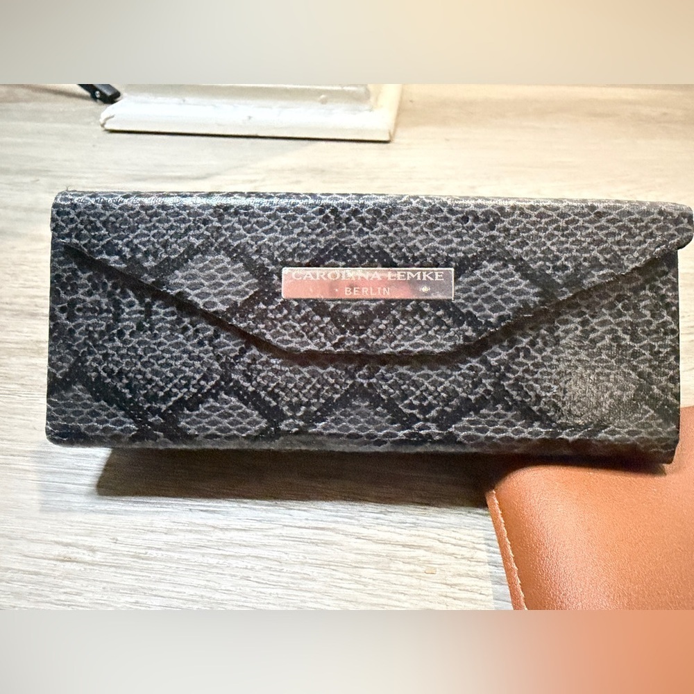 Carolina Lemke Berlin Black Snakeskin Sunglasses case